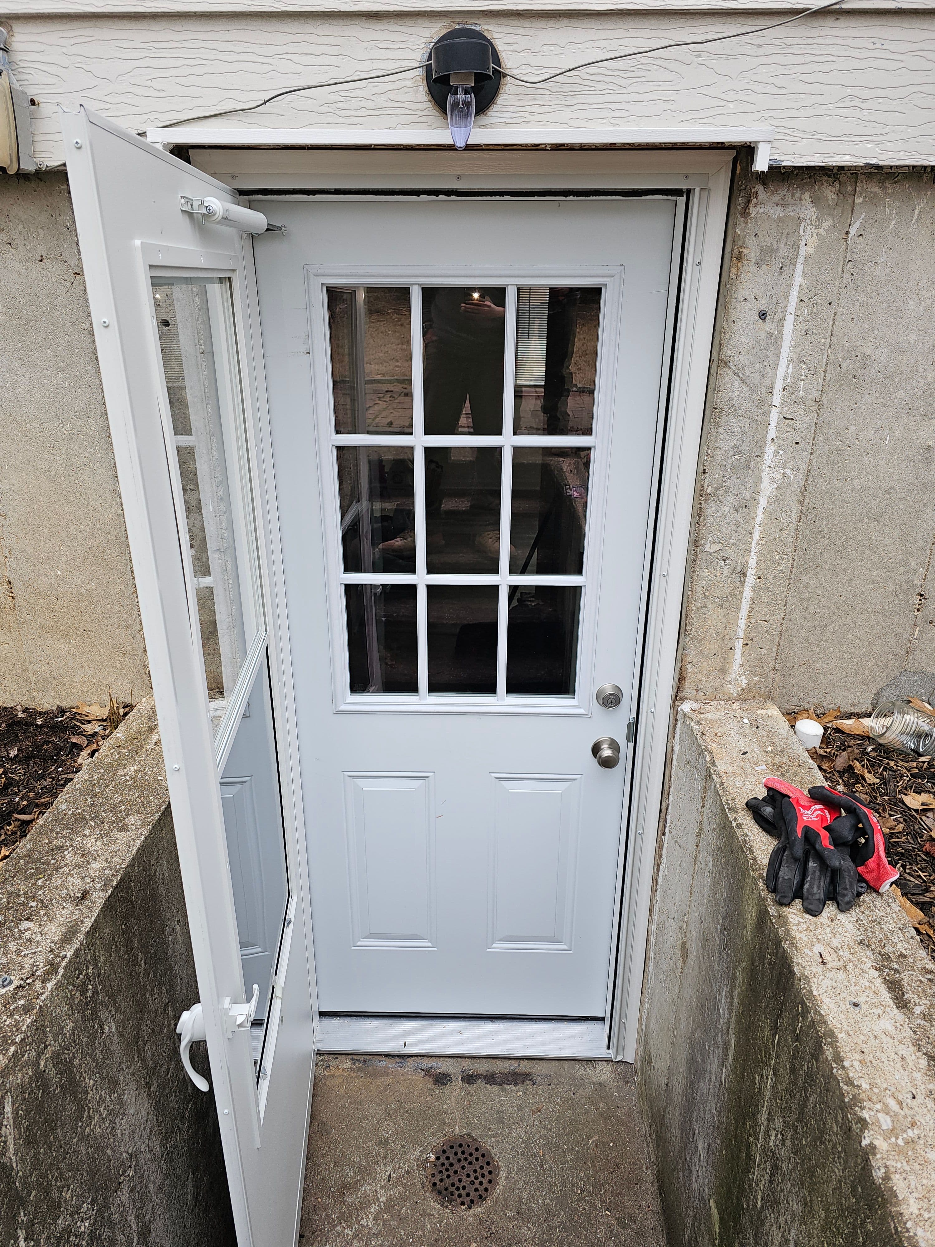 Door and Storm door down stairs